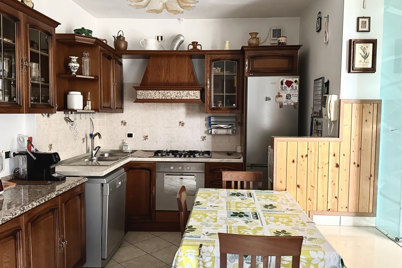 Fridge, oven, dishwasher, dining tables