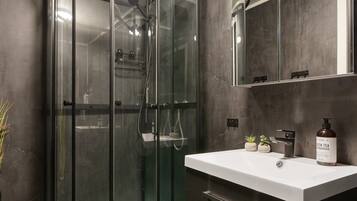 Hair dryer, towels, soap, shampoo