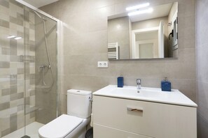 Hair dryer, towels, toilet paper