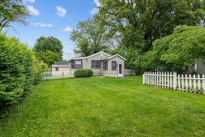 Exterior - Cozy Cottage Home w/ Fenced Yard in Rock Island (Rock Island)
