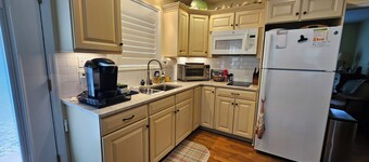 Sam's Place.  UPDATED LISTING!  Relax in the hot tub after a day of golf!