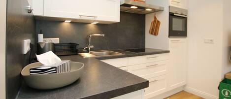 Réfrigérateur, four, plaque de cuisson, lave-vaisselle