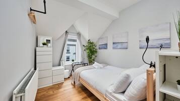 1 bedroom, desk, iron/ironing board, travel cot