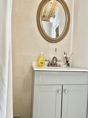 Hair dryer, towels, soap, toilet paper