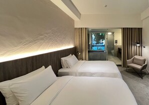 Premium bedding, down duvets, free minibar, in-room safe