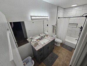 Hair dryer, towels, soap, shampoo