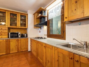 Fridge, microwave, toaster, cookware/dishes/utensils