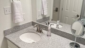 Hair dryer, towels, soap, shampoo