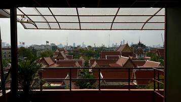 Classic Quadruple Room, City View | Terrace/patio