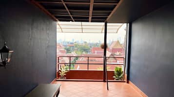 Comfort Quadruple Room, City View | Terrace/patio