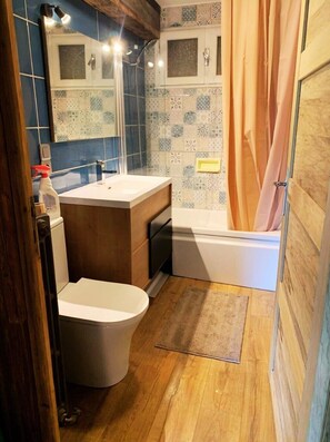 Hair dryer, towels, soap, shampoo