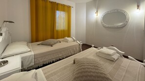 StrykjÀrn/strykbrÀda, gratis wi-fi och sÀngklÀder