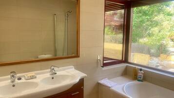 Shower, jetted bath, hair dryer, bidet