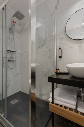 Economy Double Room | Bathroom | Shower, hair dryer, slippers, towels - Hotel Atria (Brasov)