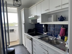 Fridge, microwave, dishwasher, coffee/tea maker