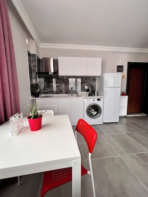 Habitación Confort | Cocina privada