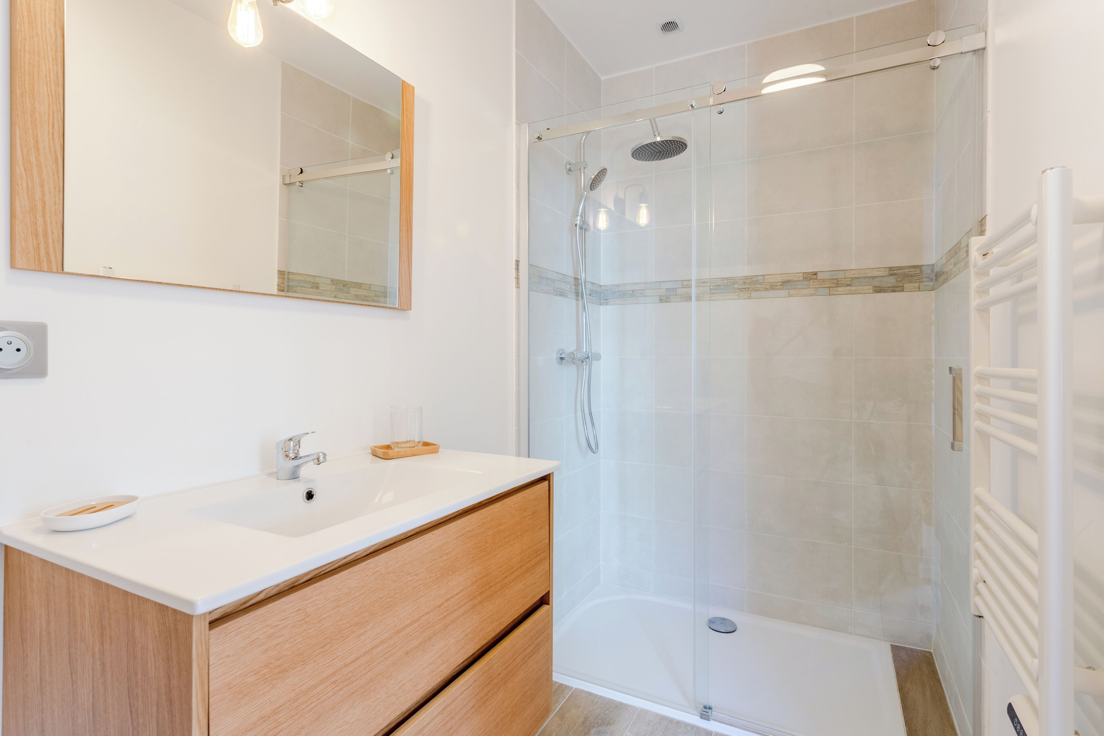 Shower, hair dryer, towels, soap