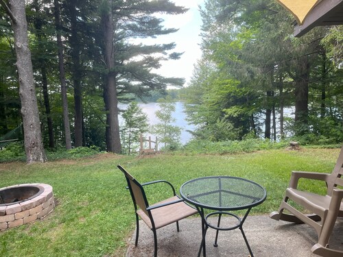 Cozy waterfront sunset cottage on Herendeene Lake in Lake Ann, Dock, Dog ok