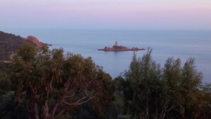 A coastal landscape with a prominent rocky island featuring a tower. - 2 bedroom mobile home in saint-raphaã "l (Saint-Raphaël)
