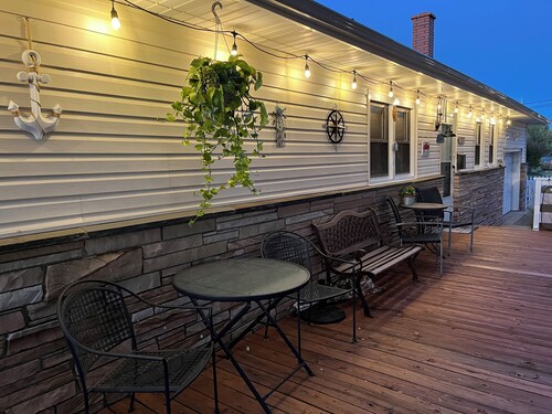 Spacious home with a view of the Shark River and a game room.
