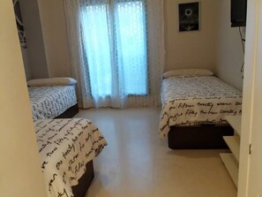 2 dormitorios, tabla de planchar con plancha, wifi y ropa de cama