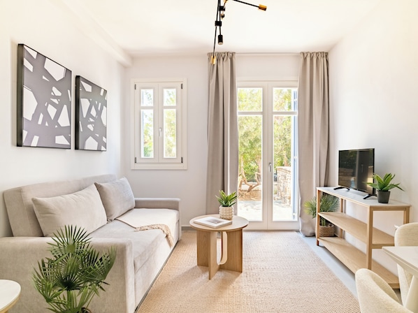 Appartement, 1 chambre, patio | Salle de séjour