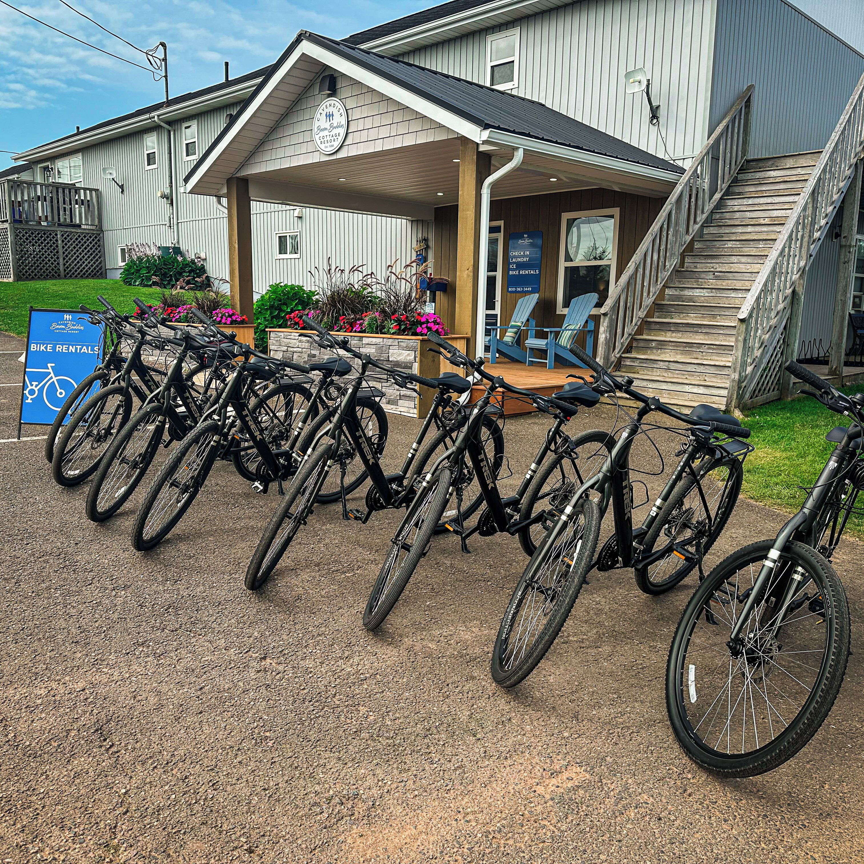 A building with a sign indicating bike rentals.