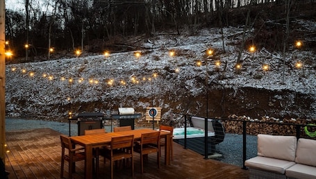 Outdoor dining. Ava A-Frame•Hot Tub•Theater•Hidden Stair•EV Charge