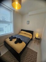 Apartamento conforto, 2 quartos, vista para o mar | 2 quartos, quartos à prova de som, Wi-Fi de cortesia, roupa de cama