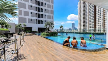 Indoor pool, outdoor pool, pool umbrellas, pool loungers