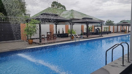 Outdoor pool. ANIRA Hotel & Suites