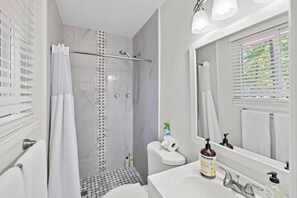 Shower, hair dryer, towels, soap