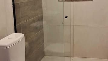 Economy Double Room, Lanai | Bathroom | Towels, soap, shampoo, toilet paper