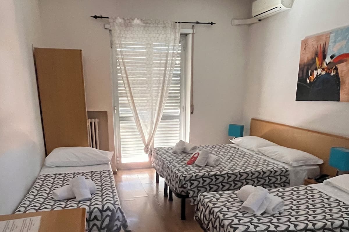 Basic Quadruple Room, Balcony | Desk, iron/ironing board (on request), WiFi (free)