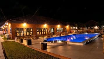 Outdoor pool, open 6:30 AM to 10:00 PM, pool umbrellas, pool loungers