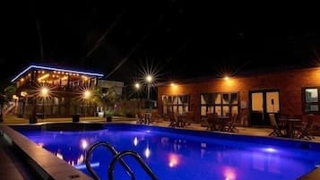 Outdoor pool, open 6:30 AM to 10:00 PM, pool umbrellas, pool loungers