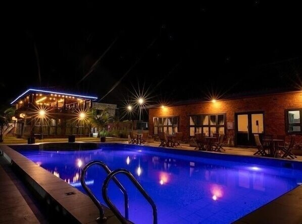Outdoor pool, open 6:30 AM to 10:00 PM, pool umbrellas, pool loungers