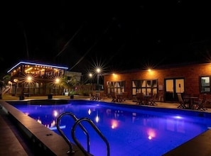 Outdoor pool, open 6:30 AM to 10:00 PM, pool umbrellas, pool loungers