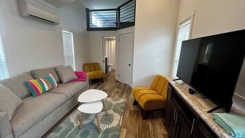 Superior Cabin | Living area | 32-inch Smart TV with digital channels, Netflix, Hulu