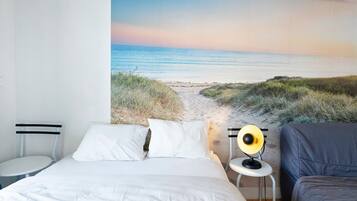 1 chambre, fer et planche à repasser, draps fournis