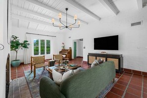 Smart TV, fireplace, table tennis, books