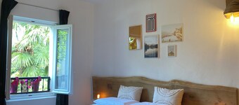 The Pink House of Riso Amaro In the painted village Legro  of Orta San Giulio