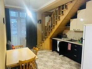 Room, City View | Private kitchen | Stovetop, cleaning supplies, freezer - Home in old tbilisi (Tbilisi)