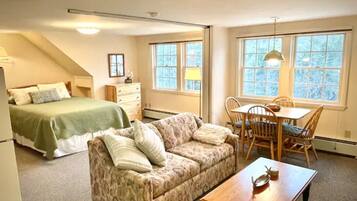 Smart TV, fireplace, books, offices