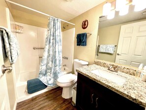 Hair dryer, towels, soap, shampoo
