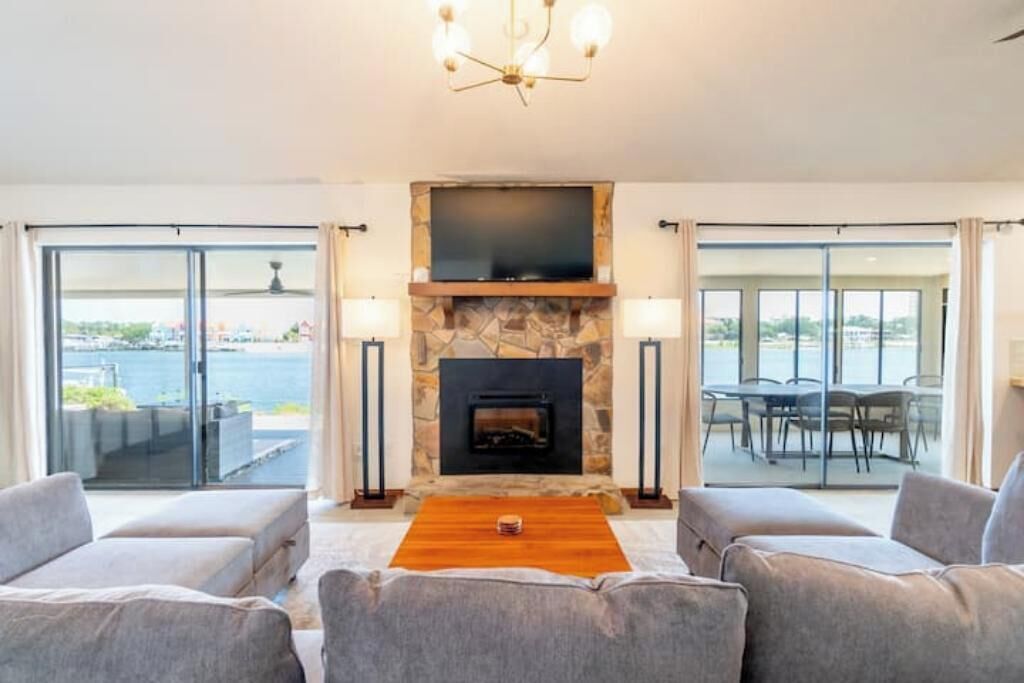 Lux Waterfront Oasis w/ Private Dock, Kayaks, Blackstone Grill, and Fire Pit