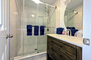 Shower, hair dryer, towels, soap