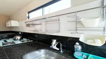 Fridge, microwave, stovetop, coffee/tea maker