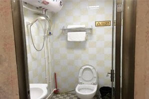 A bathroom with a shower, toilet, and a towel rack. - Xi'an Lianhu District Hospitality Hotel (Xi'an)