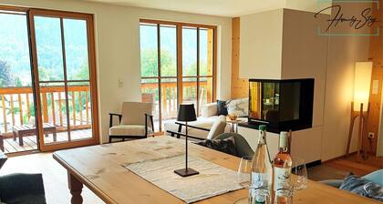Relax in our dream holiday flat with sauna and mountain views!